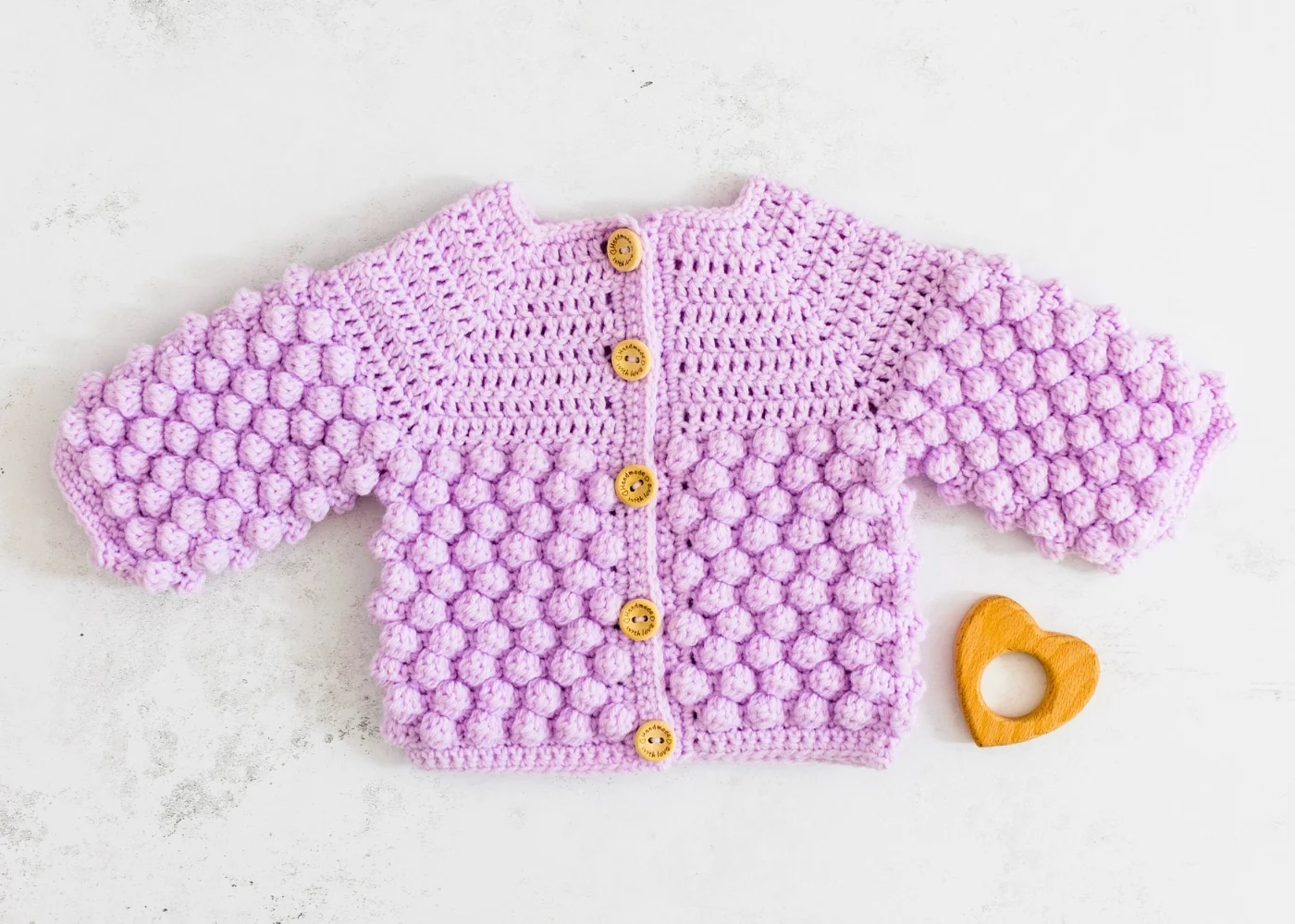 Bobble Crochet Baby Cardigan Pattern free in lilac