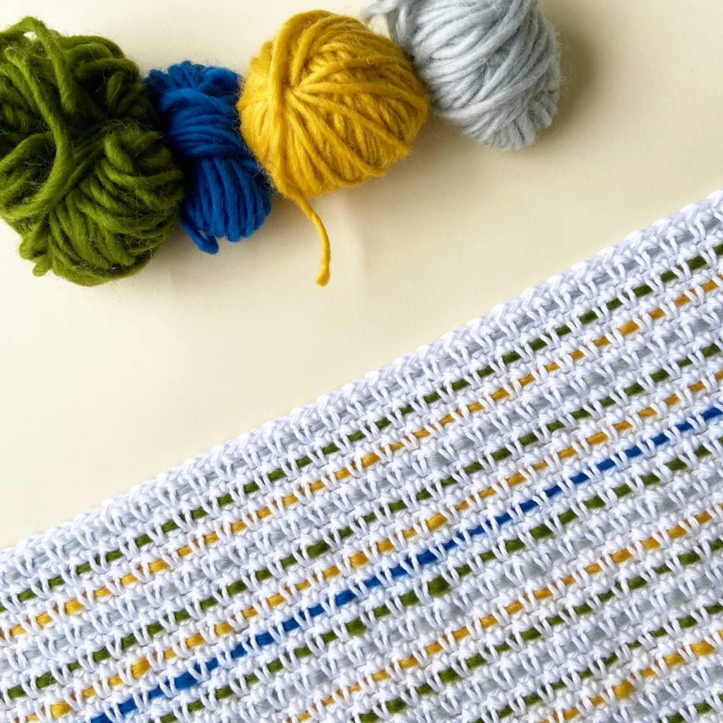 close up of woven crochet baby blanket as work in progress