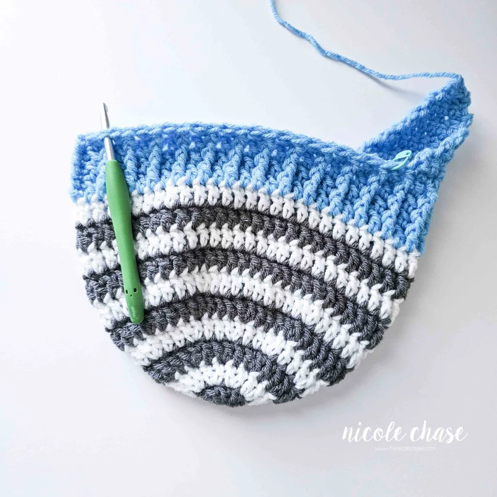 Tutorial image displaying where to start the second earflap on the crochet earflap beanie pattern.