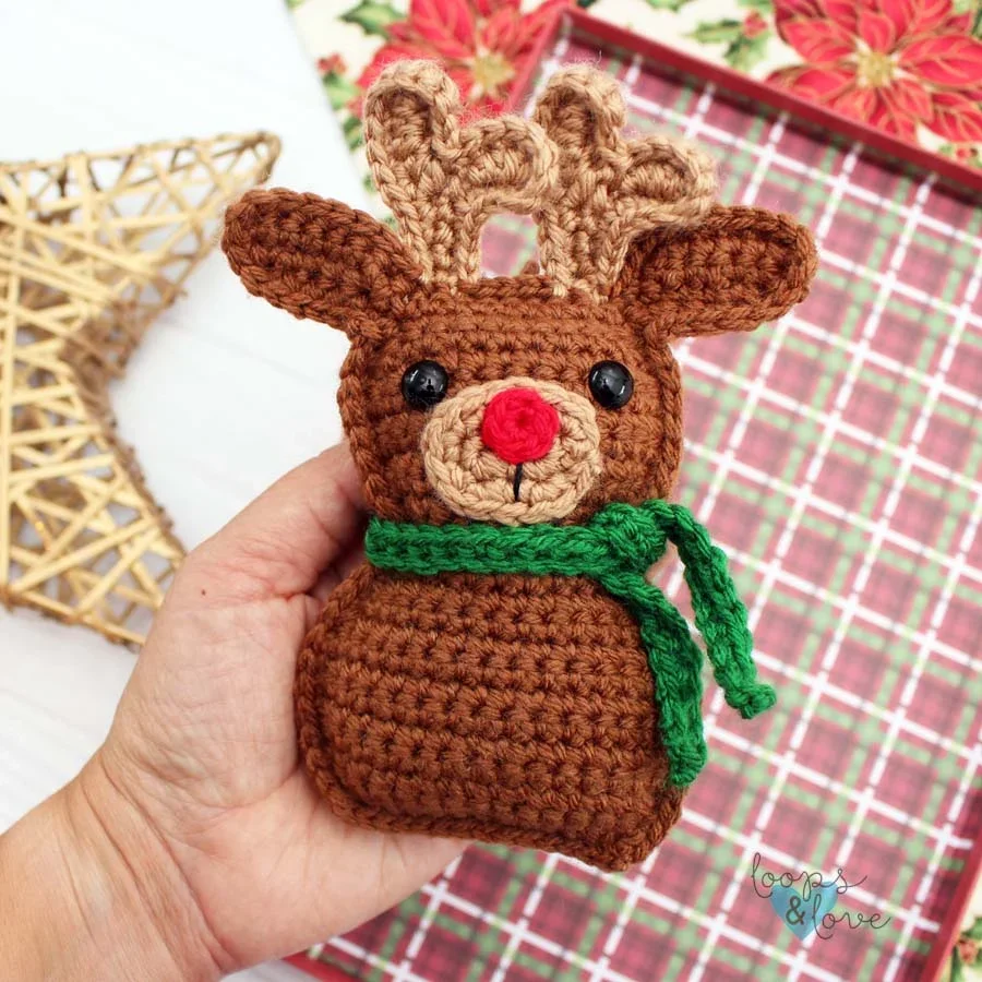 a crocheted ragdoll reindeer ornament