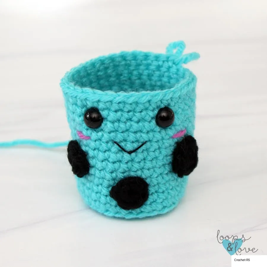 Sewing pieces on cup