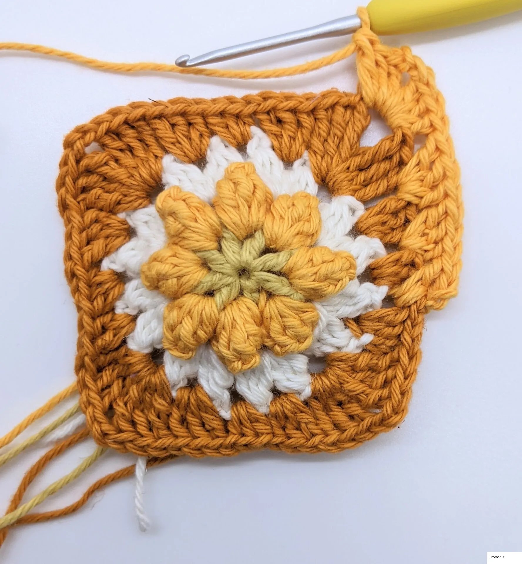 Granny square after working the corner.